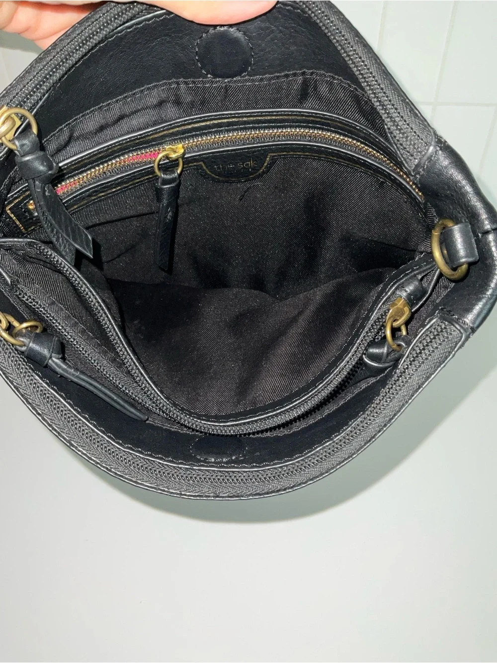 The Sak Black Leather Wristlet Clutch with Removable Strap